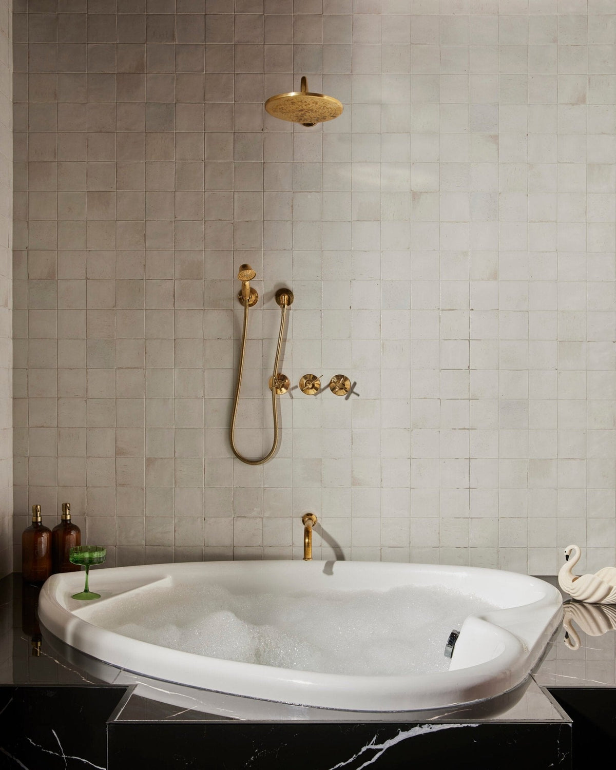 The Handheld Shower System