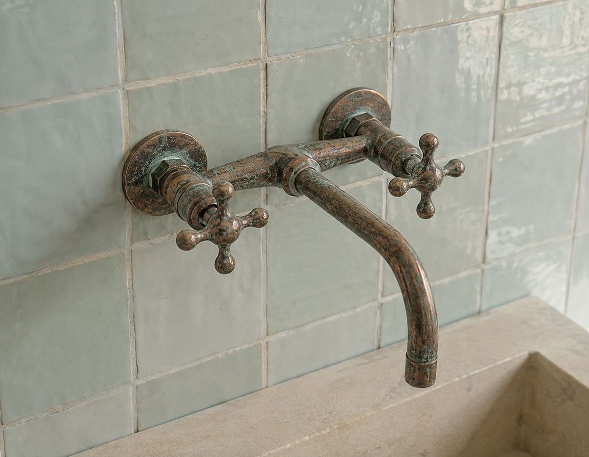Aged wall faucet